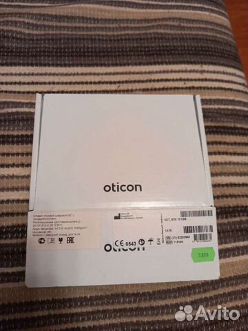Слуховой аппарат oticon