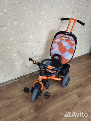 Трехколесный велосипед с ручкой