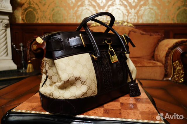 Новая сумка Gucci Secret с крокодиловыми вставками Новая сумка Gucci Secret с крокодиловыми вставками