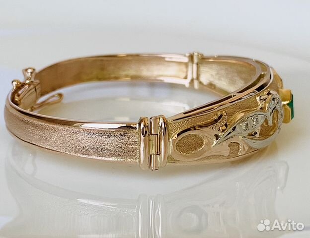 Золотой браслет с изумрудом и бриллиантами Золотой браслет с изумрудом и бриллиантами