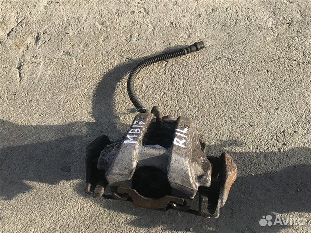Суппорт тормозной задний левый Mercedes-Benz