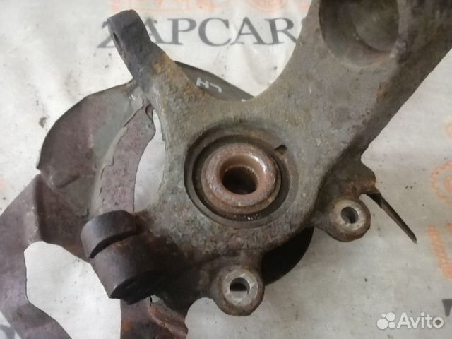 Поворотный кулак левый Mazda 3 BK Z6 2005