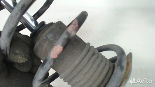 Амортизатор подвески правый передний Nissan Almera