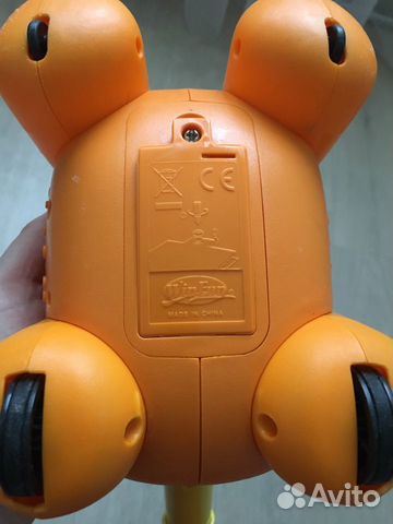 Игрушка каталка музыкальная Игрушка каталка музыкальная