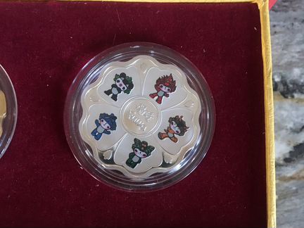 Монетовидные медальоны