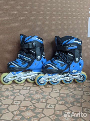 Роликовые коньки