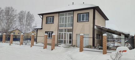 Коттедж 211 м² на участке 11 сот.