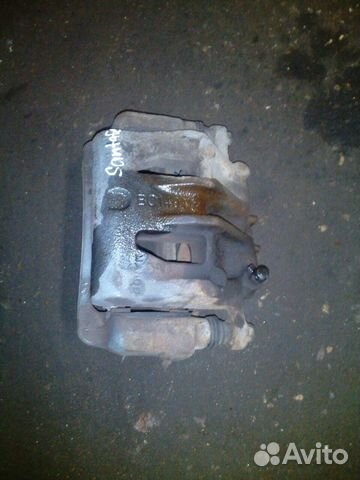 Суппорт передний левый правый Hyundai Santa FE