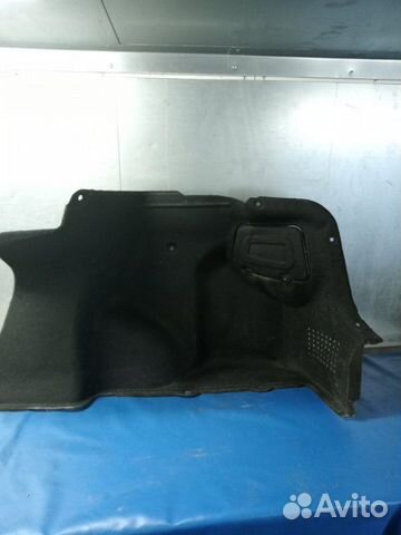 Обшивка багажника задняя правая Kia Rio седан 1.4