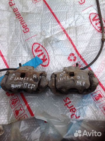 Mitsubishi Lancer 9 суппорт передний