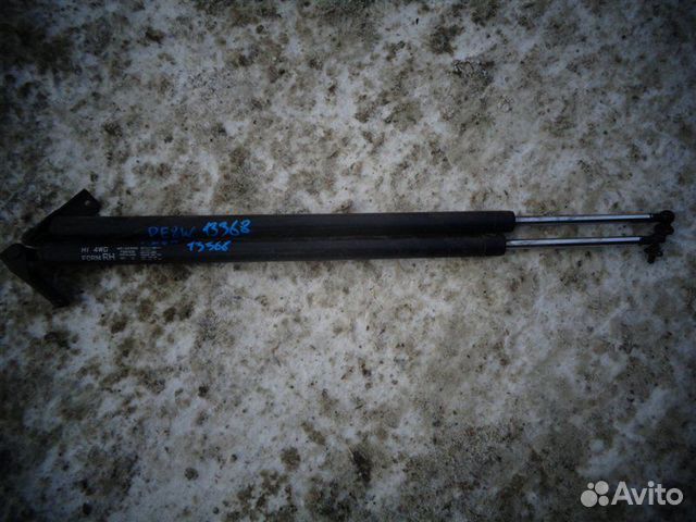 Амортизатор багажника задний Mitsubishi Delica