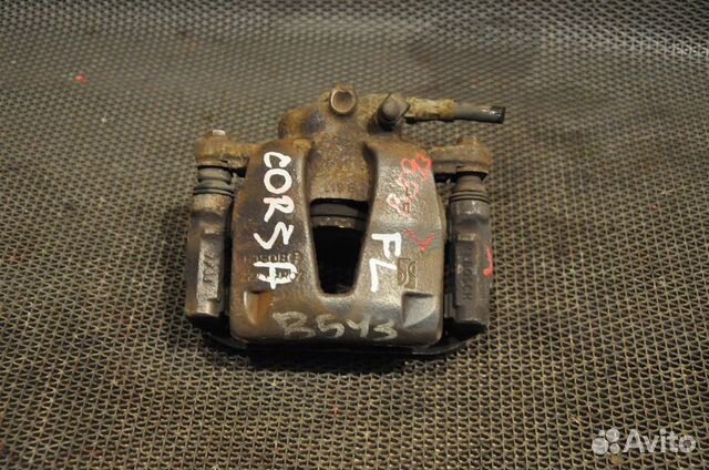 Суппорт передний левый opel Corsa D