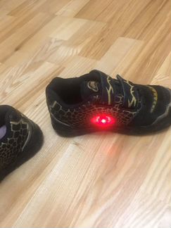 Кроссовки динозавры мигающие