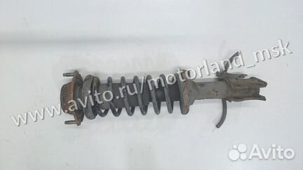 Амортизатор подвески правый передний Mazda Demio