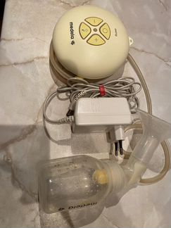 Молокоотсос Medela swing
